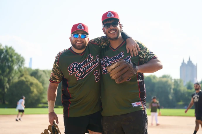 Gotham City Softball players celebrate after a game